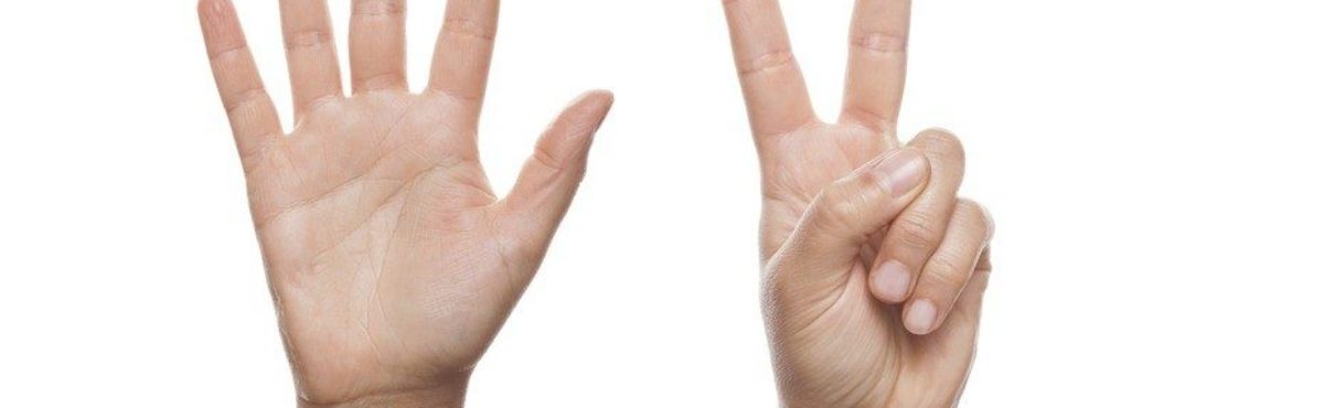 hands holding up seven fingers image