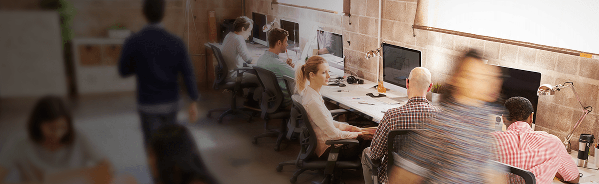 Photo of people working from a coffee shop, signifying the rise of co-working